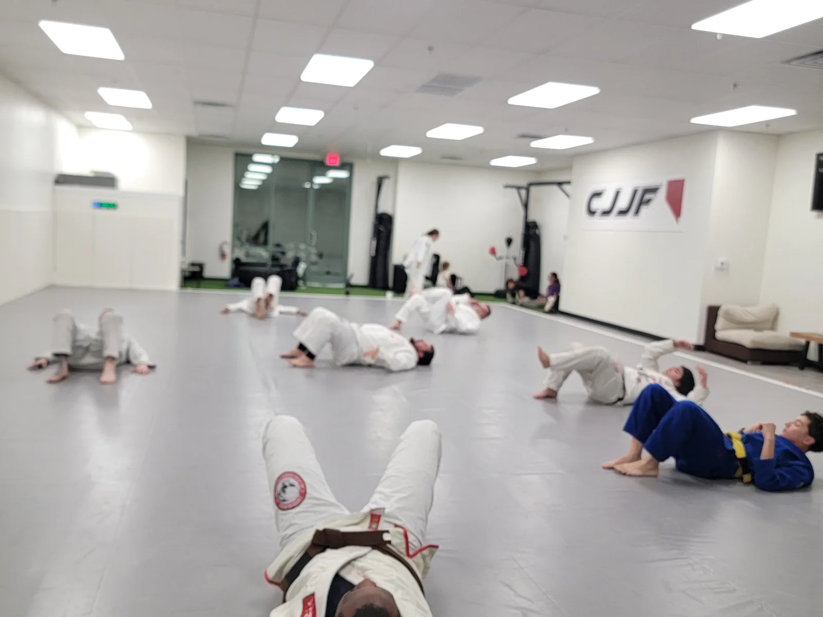 Adults drilling on the mat at CJJF Las Vegas