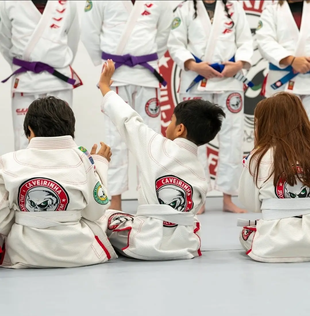 Kids in CJJF Caveirinha gi at Kids BJJ class in Las Vegas