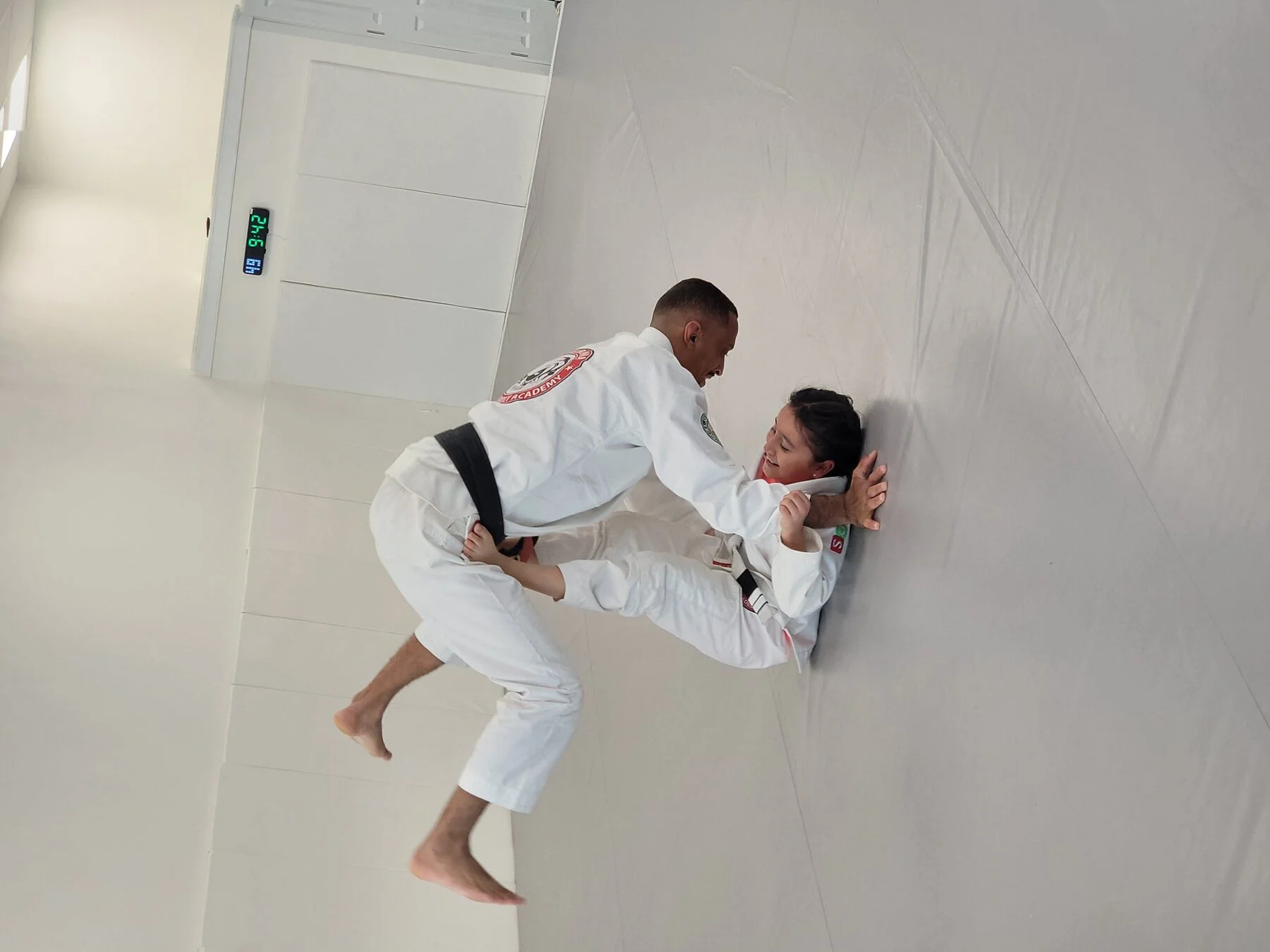 Instructor guiding young CJJF Little Warriors