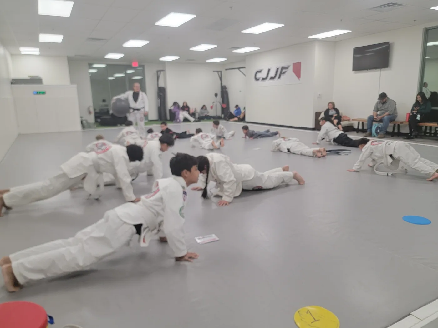 Teens drilling BJJ technique at CJJF Las Vegas Teens Jiu-Jitsu class
